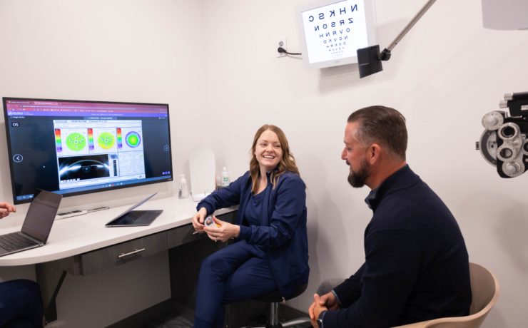 optometrist omaha megan anderson O.D. with patient.