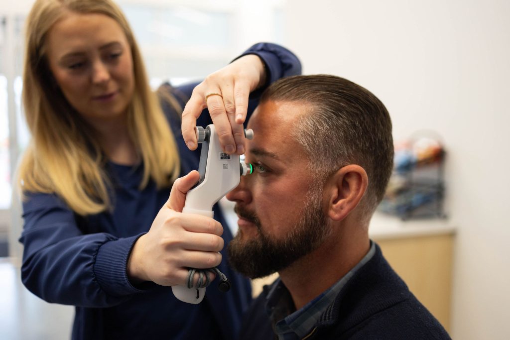 Eye Exam on patient Eye Exam on patient